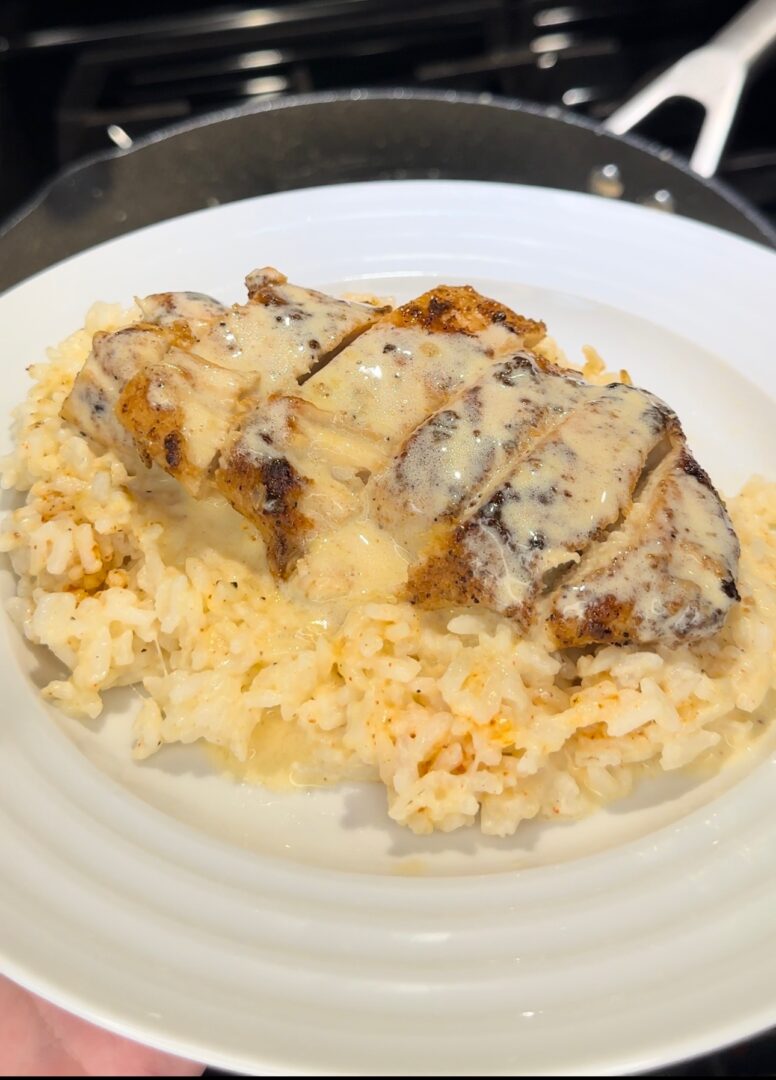 creamy cajun chicken and rice on a plate