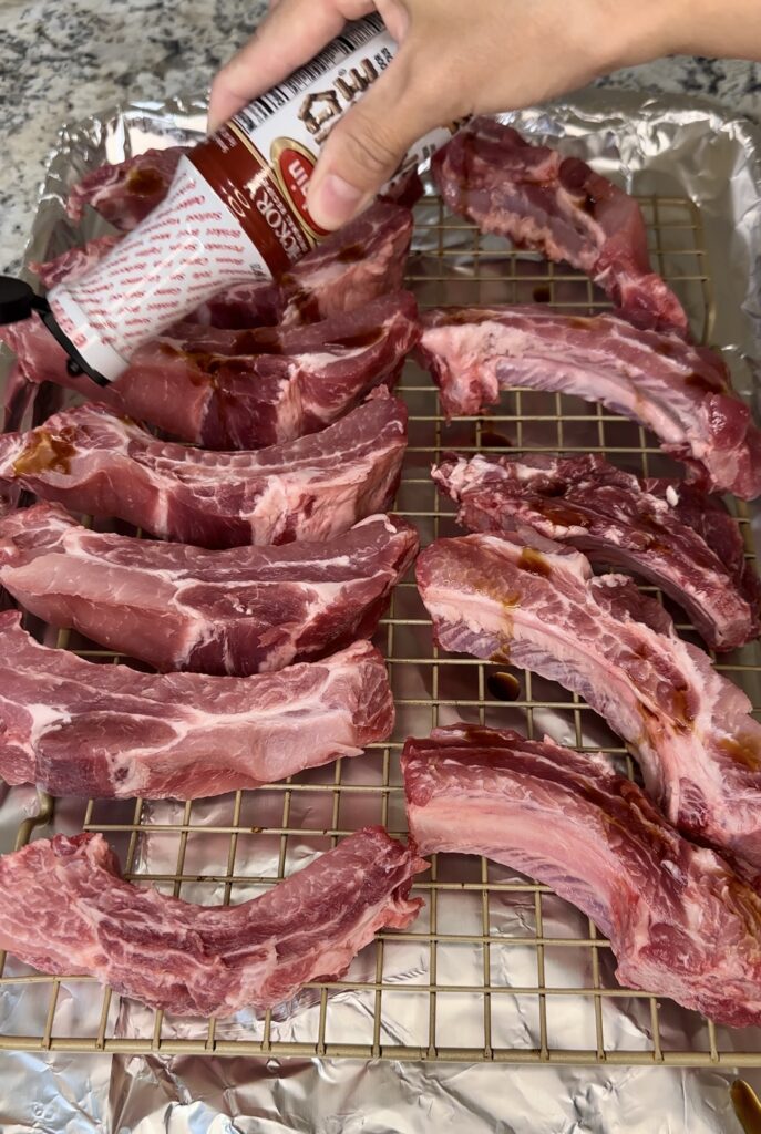 applying liquid smoke to ribs