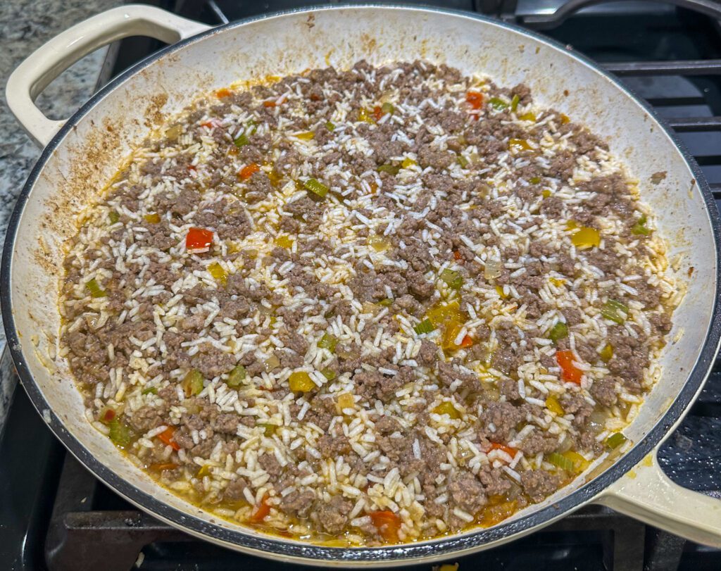 precooked rice in ground beef mixture